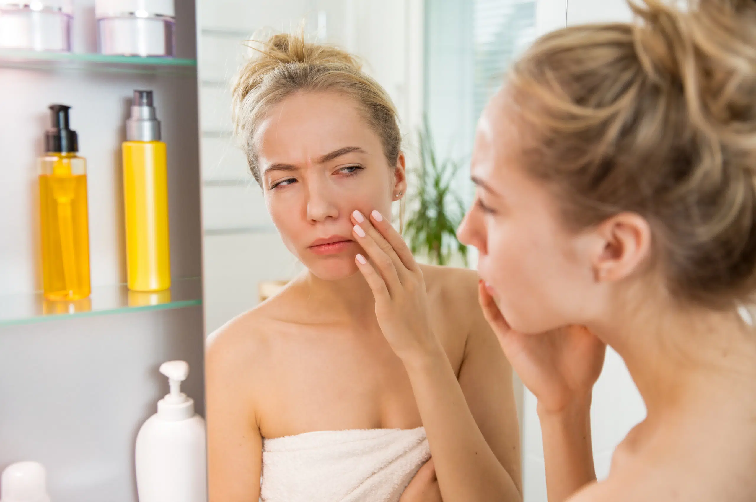 Woman checking her face