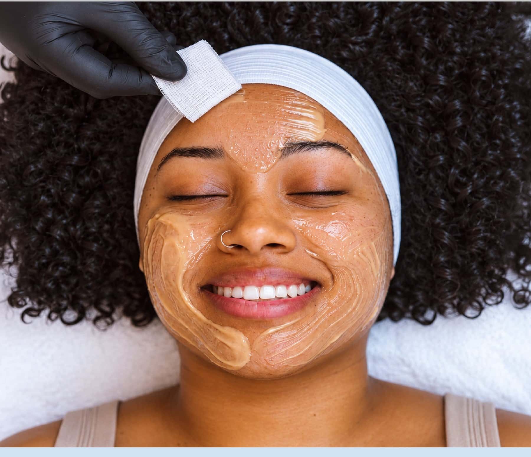 A guest with a treatment mask during the GLP-1 Volmira Facial